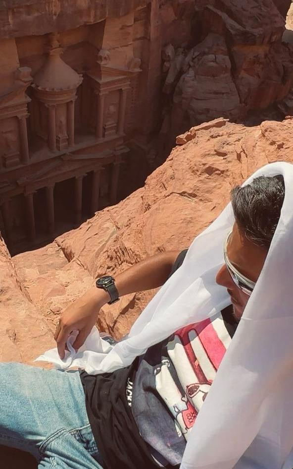 Arsalan walking among the sandstone of Petra
